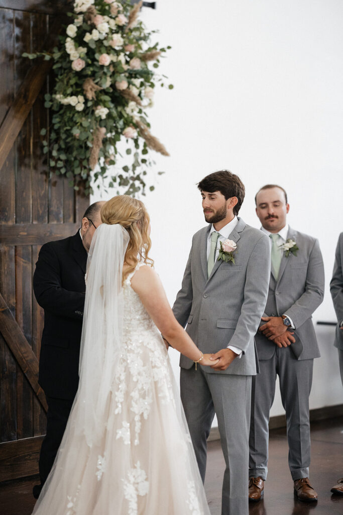 bride and groom emotional at their wedding ceremony 