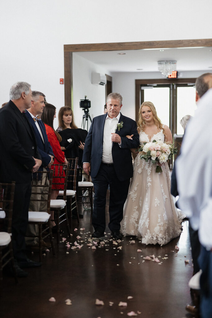 beautiful bride walking down the aisle 