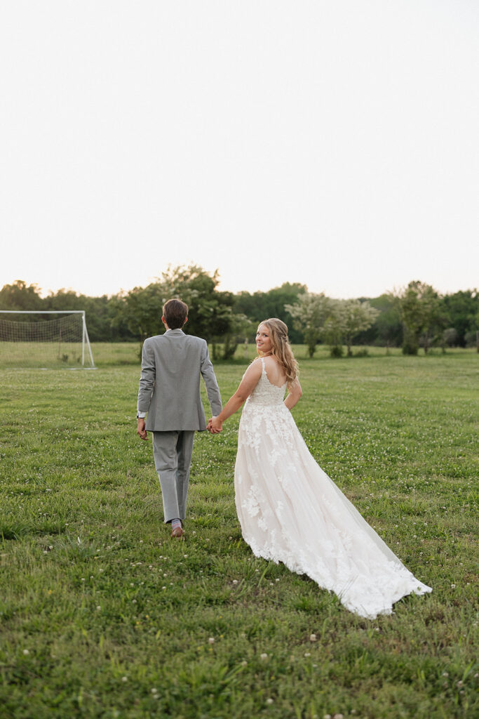 couple walking around their wedding venue 