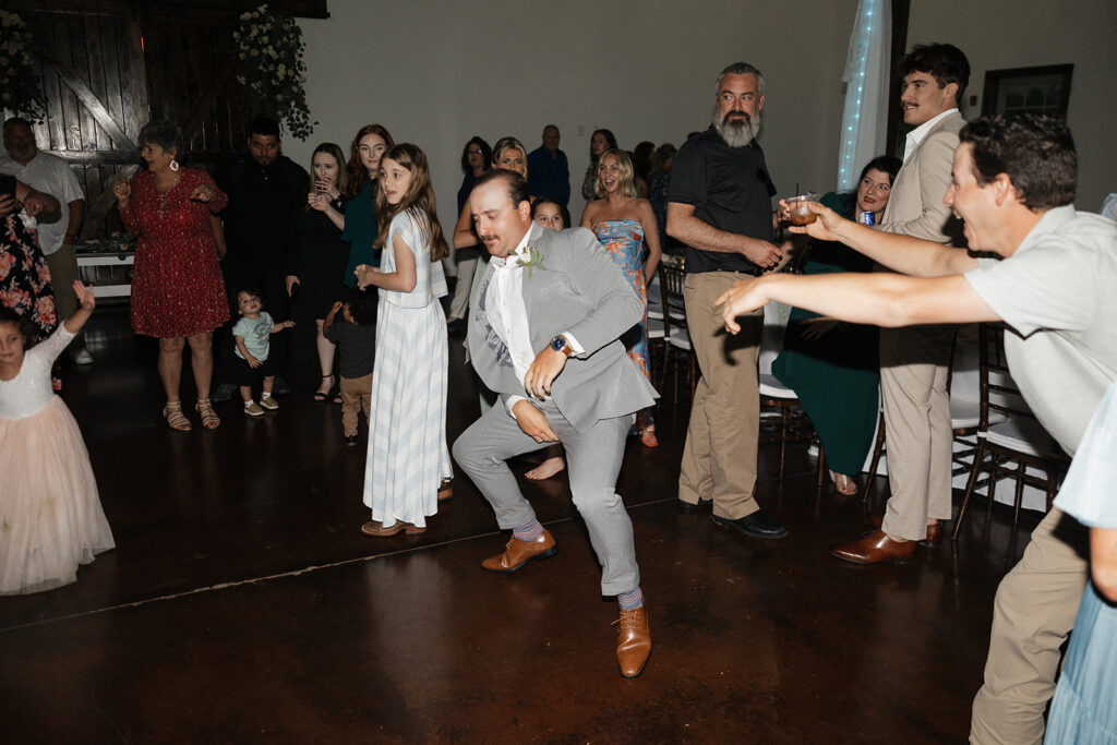 guests dancing at the wedding reception