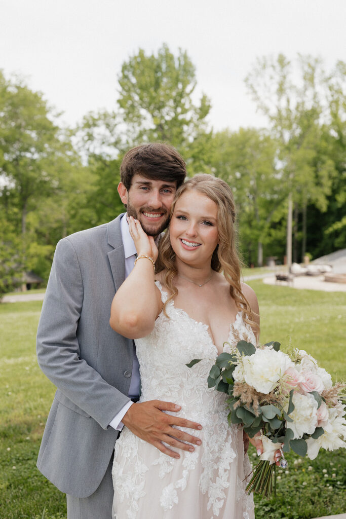 bride and groom looking at the camera during their photoshoot