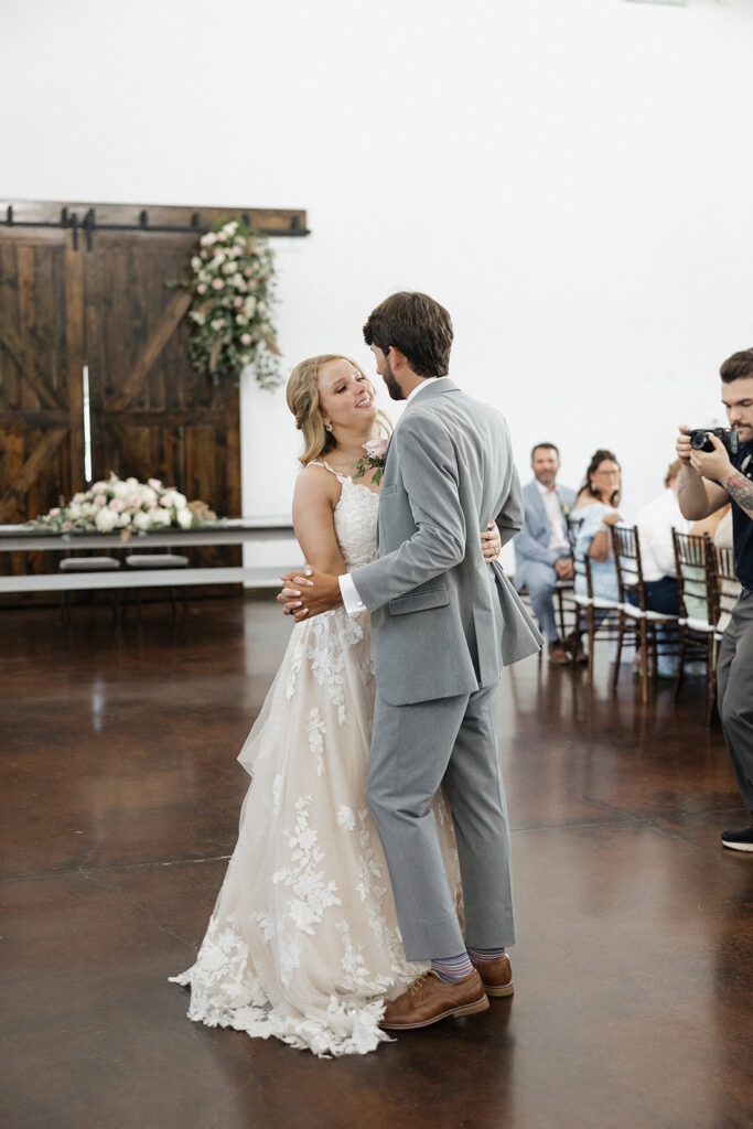 cute newly married couple dancing 