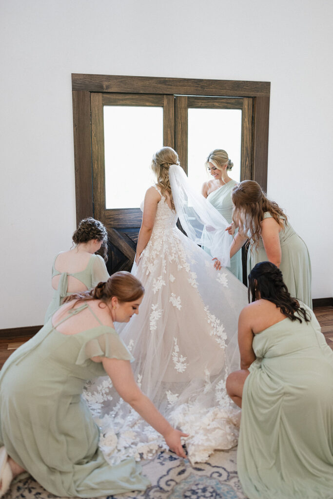 bride and her bridesmaids before the wedding ceremony