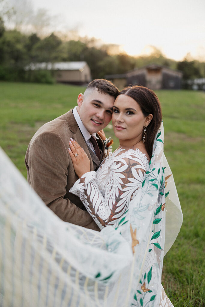 bride and groom looking at the camera