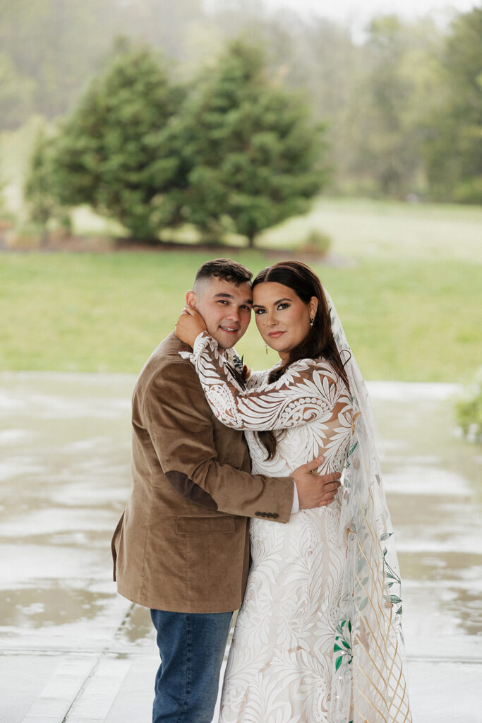 bride and groom looking at each other 