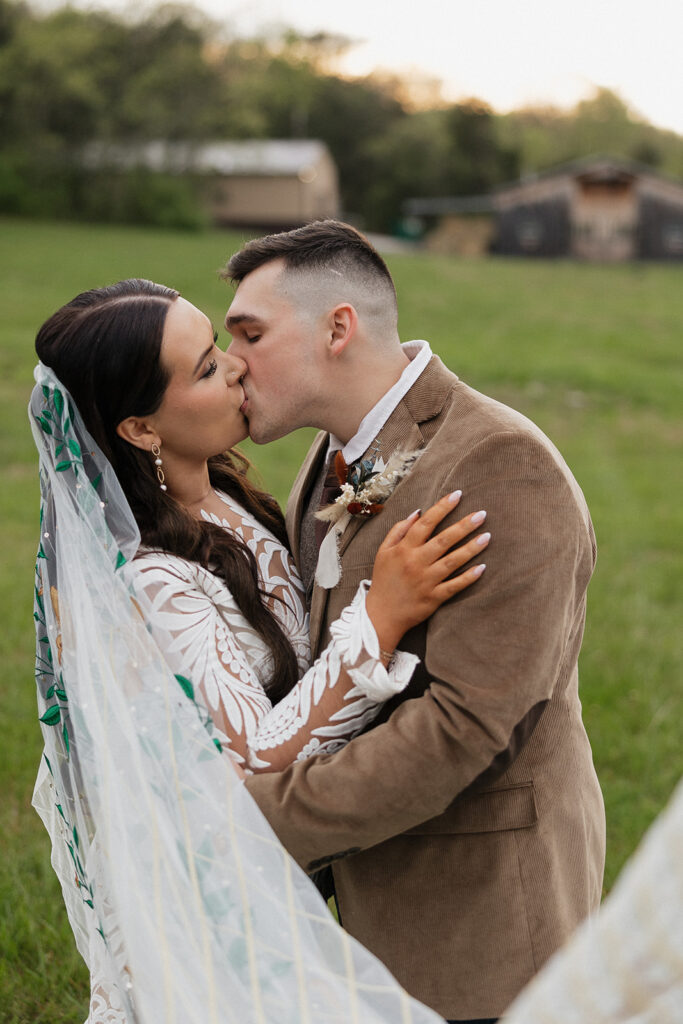 newly married couple kissing