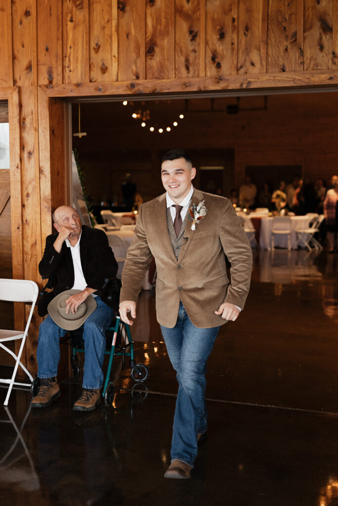 groom walking down the aisle 