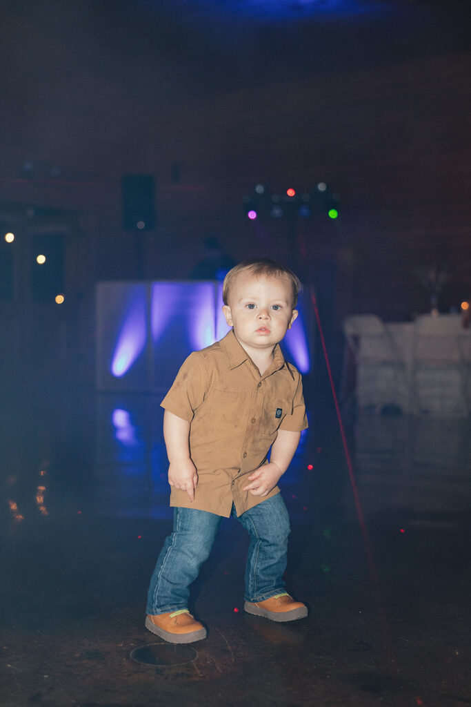 little boy dancing at the wedding party