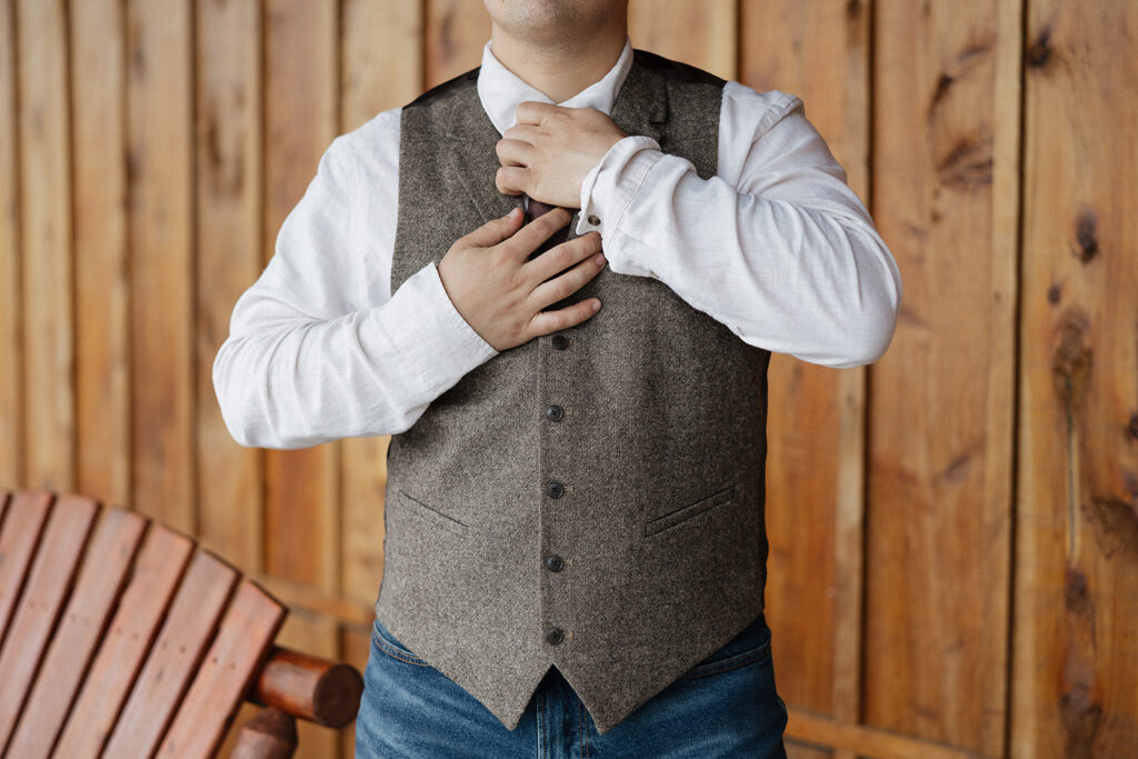 groom before his first look with the bride