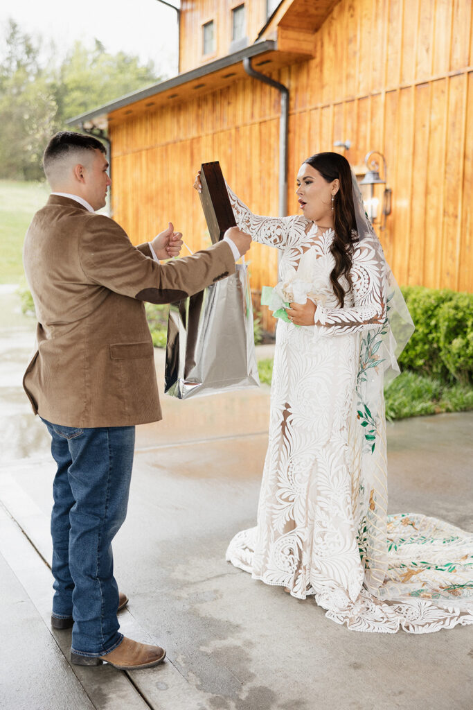 bride opening her wedding gift 