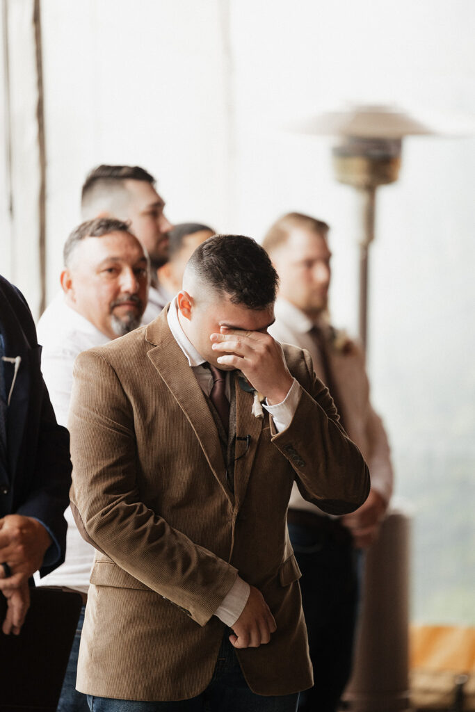 groom emotional at his boho wedding ceremony