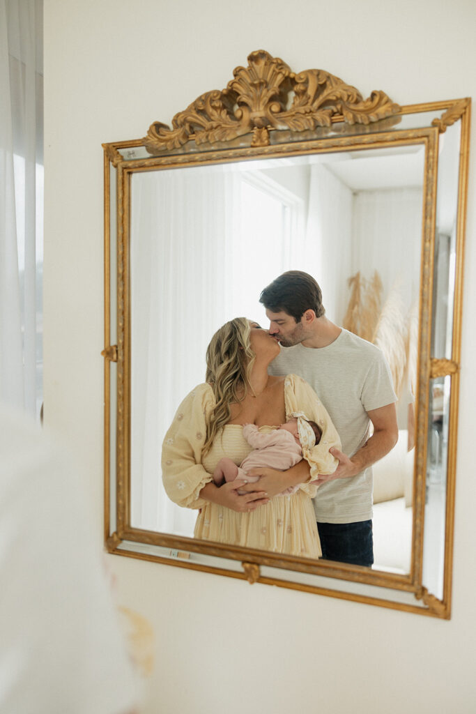 couple kissing during their photoshoot