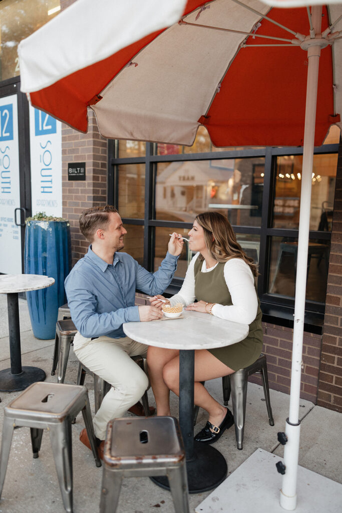 couple eating ice cream during their engagement session