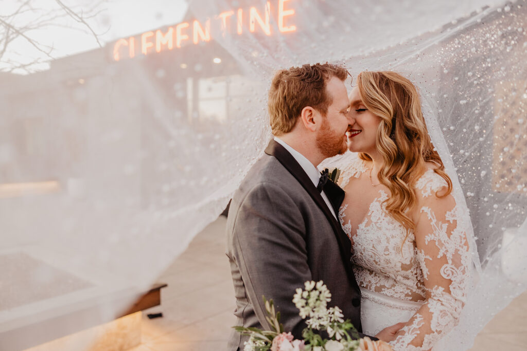 cute picture of the bride and groom at their timeless wedding venue 