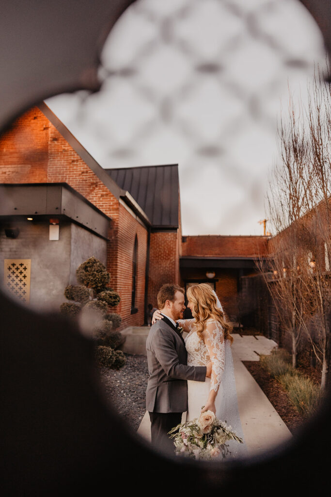 cute couple looking at each other during their photoshoot