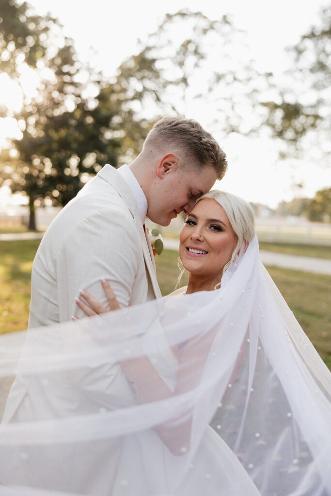 couple posing for the camera during their photoshoot