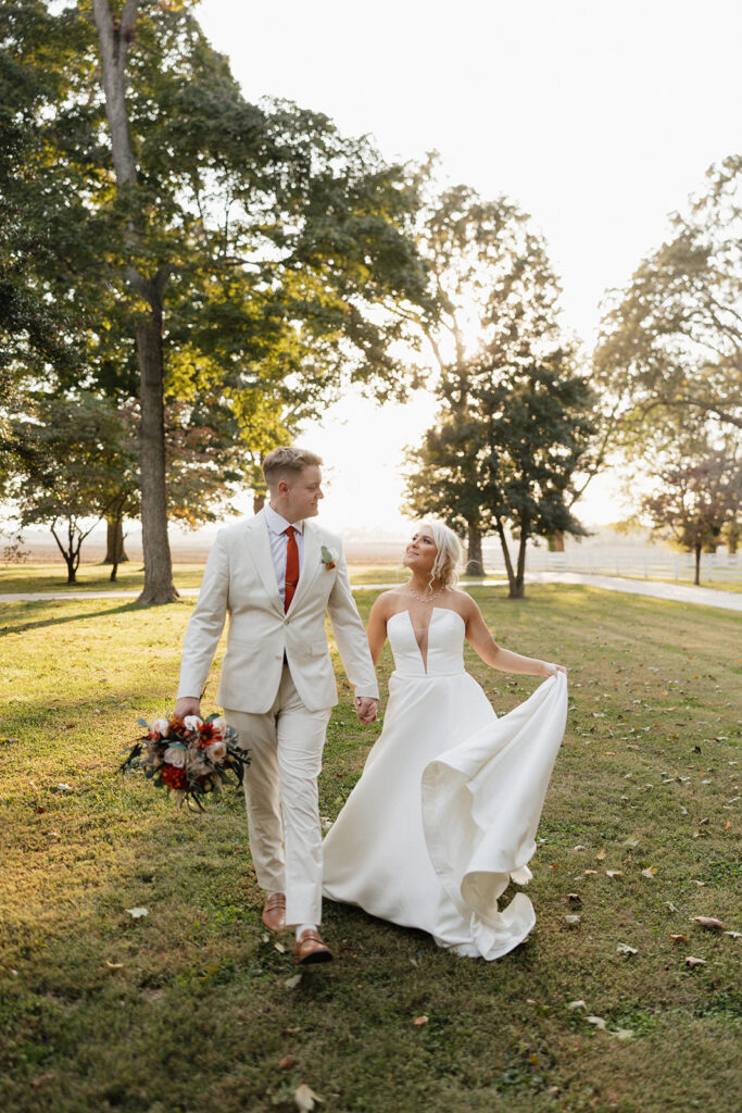 couple walking around their dream wedding venue