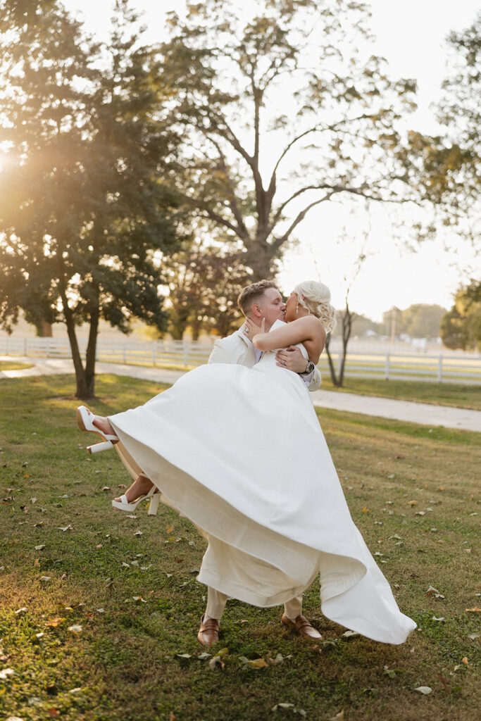 portrait of the newlyweds kissing