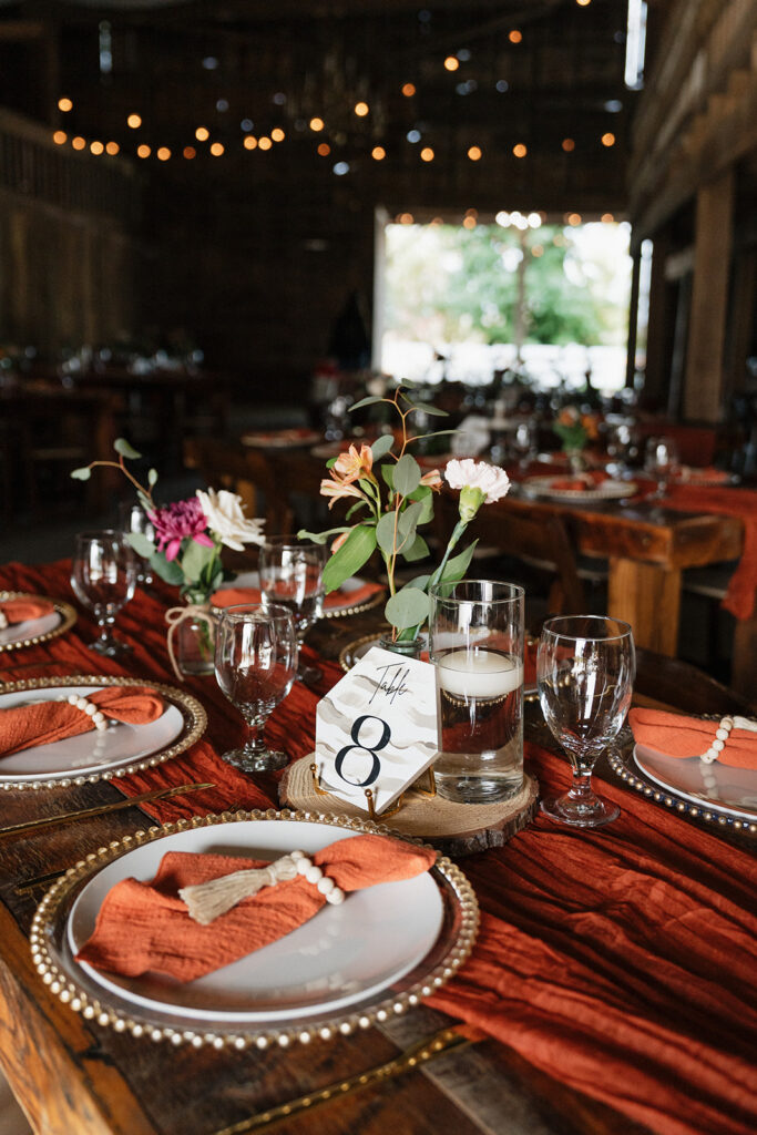 reception decor with pops of orange 