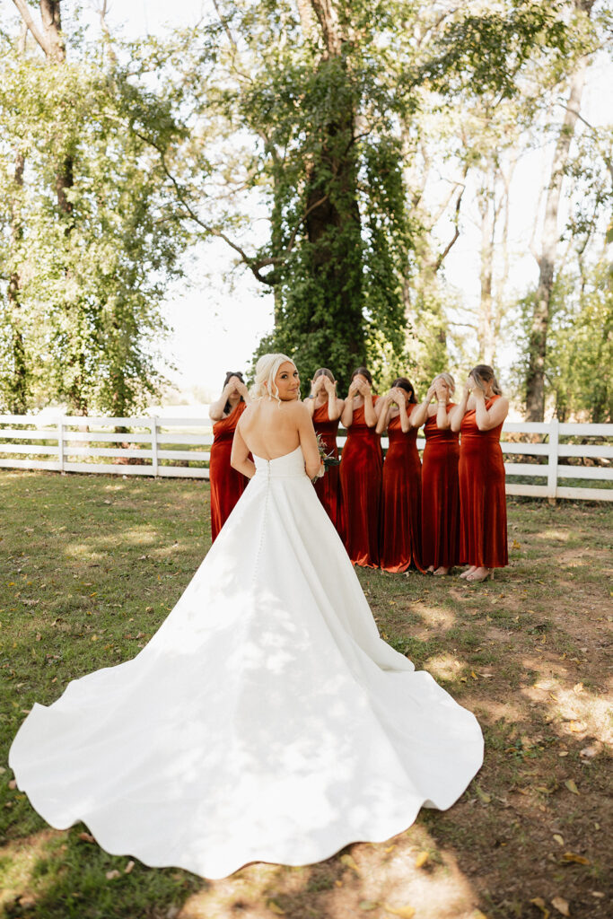 first look of the bride and her bridesmaids