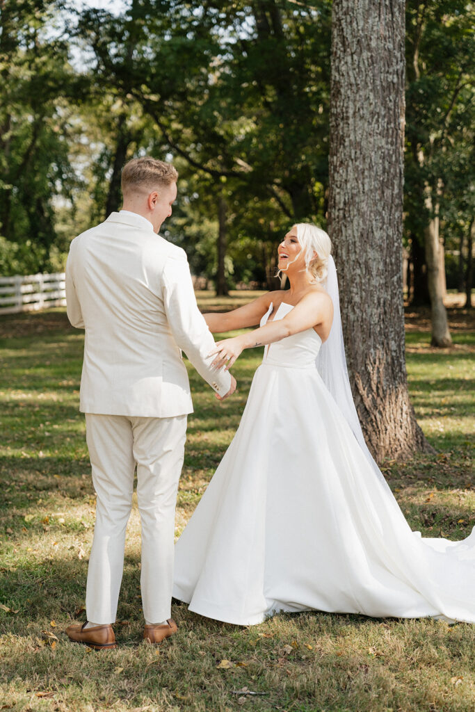 cute reaction of the groom during his first look with the bride