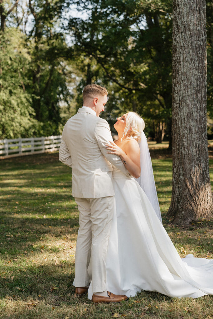 cute couple looking at each other during their first look