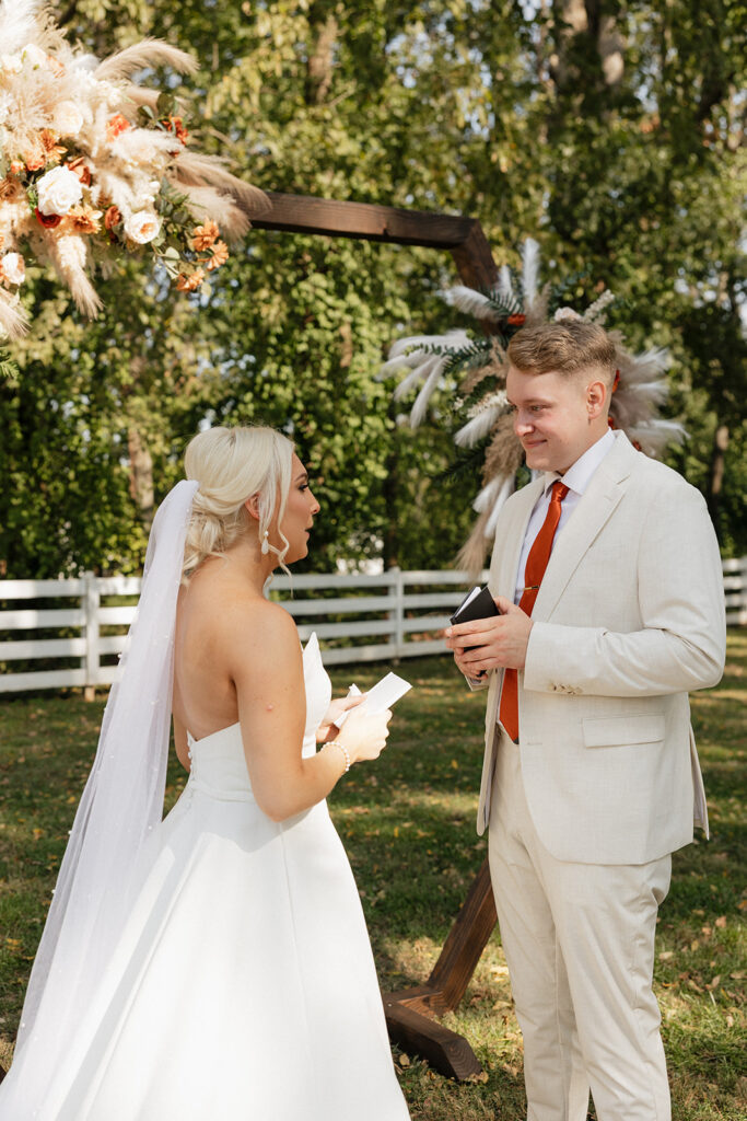 bride and groom exchanging their vows 