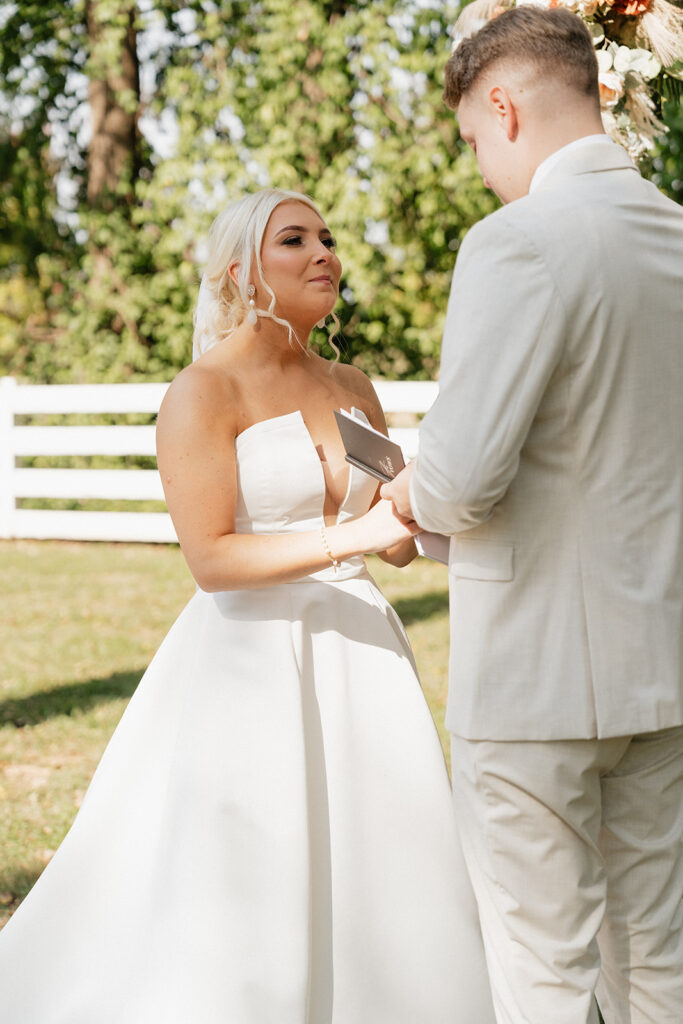 bride reading her vows to the groom