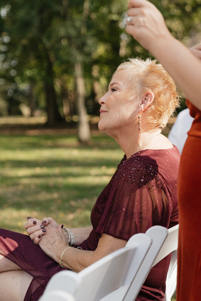 mother of the bride at the colorful boho wedding first look