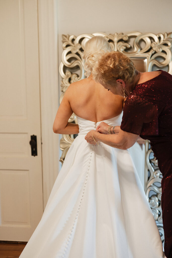 cute portrait of the bride getting ready for her colorful boho wedding day 