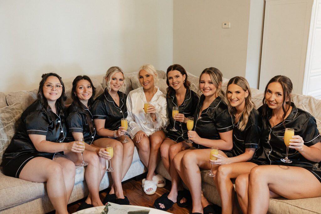 cute picture of the bride and her bridesmaids before getting ready for the ceremony