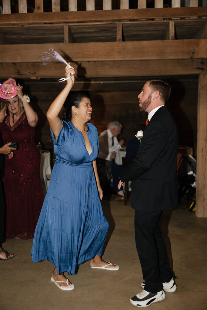 wedding guests dancing at the reception party