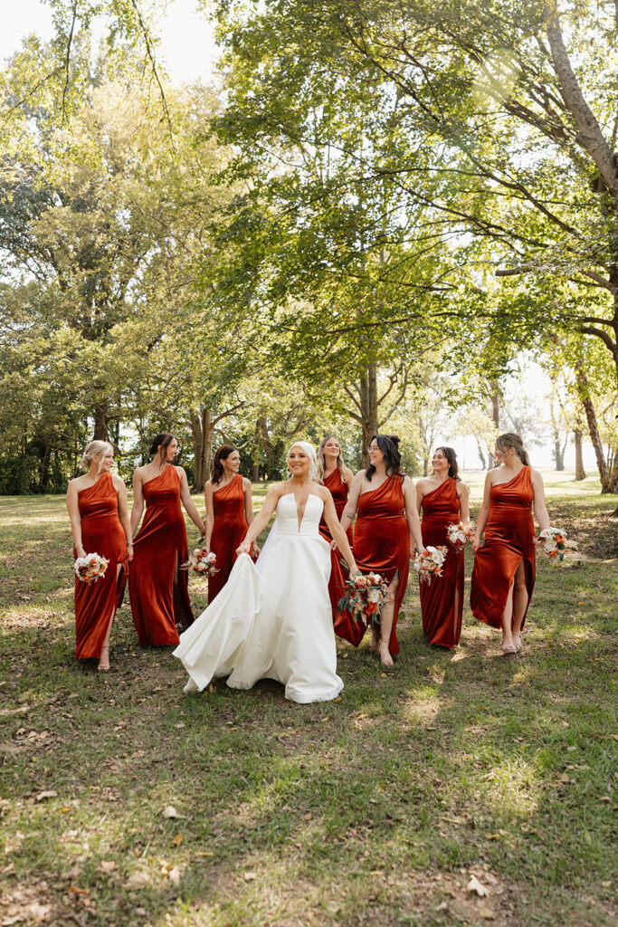 bride and her friends walking around the wedding venue 