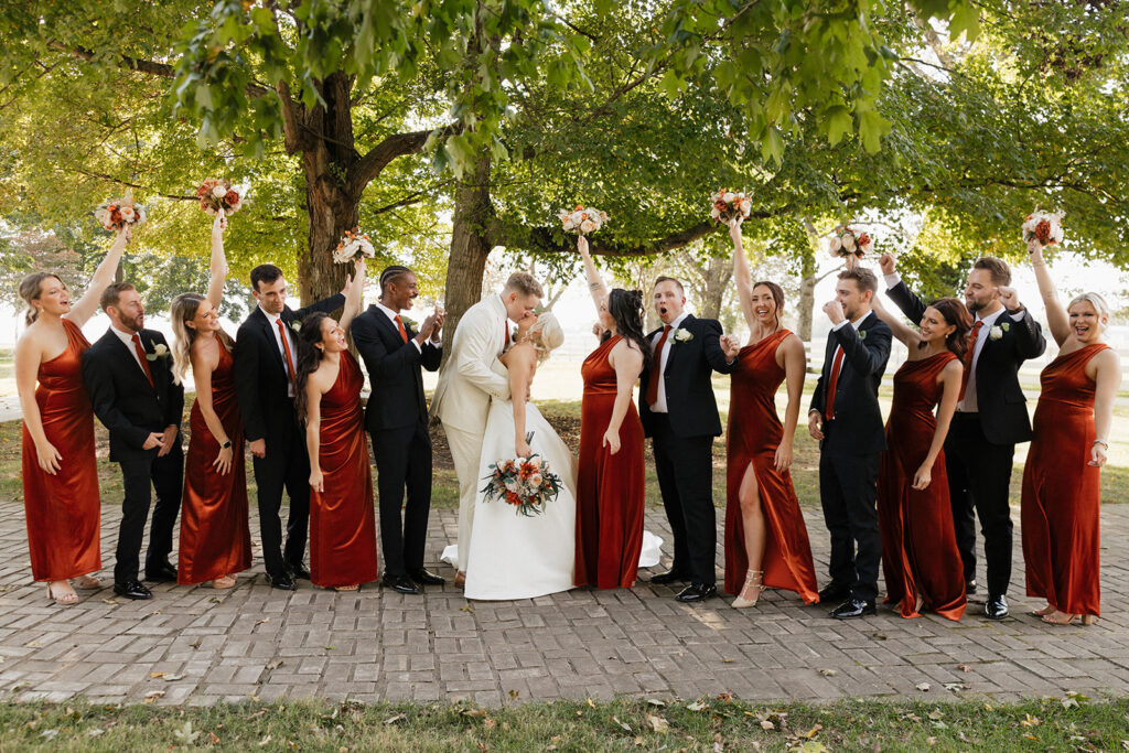 picture of the bride and groom kissing 