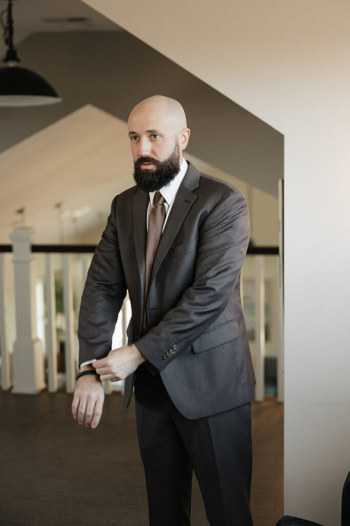 groom before heading to his beach wedding ceremony