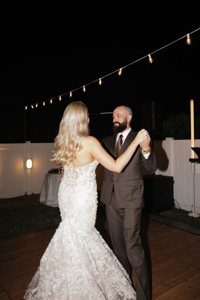 bride and groom first dance at their reception