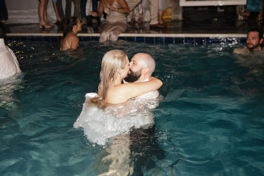 cute picture of the newlyweds kissing