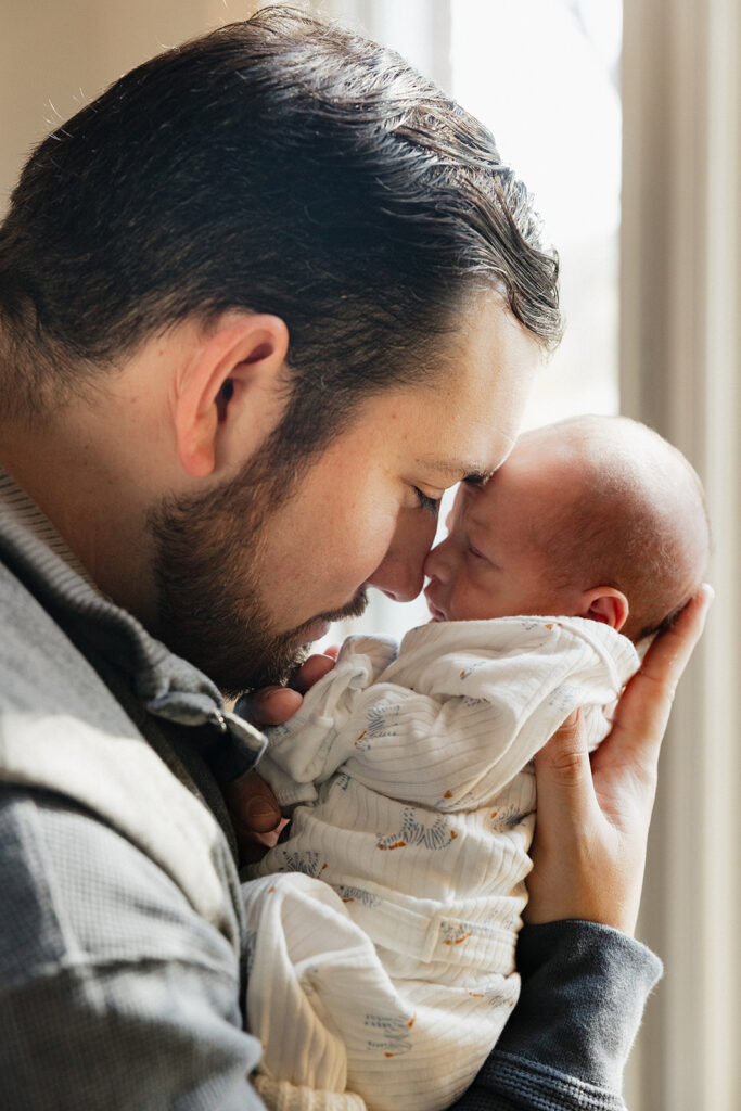 picture of the dad and his newborn