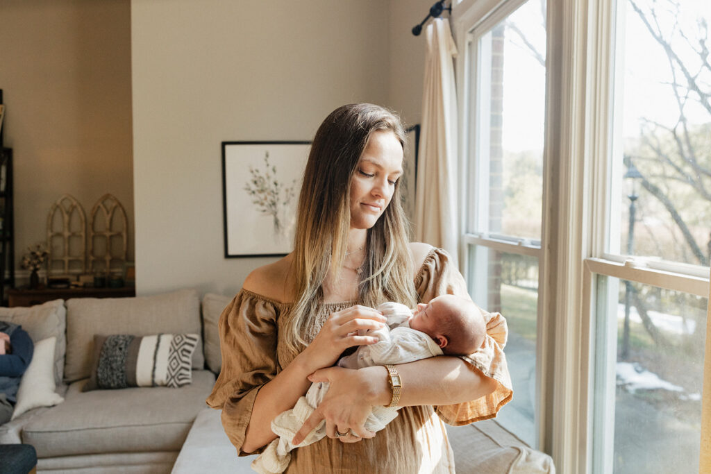 cute picture of the mom with her newborn baby