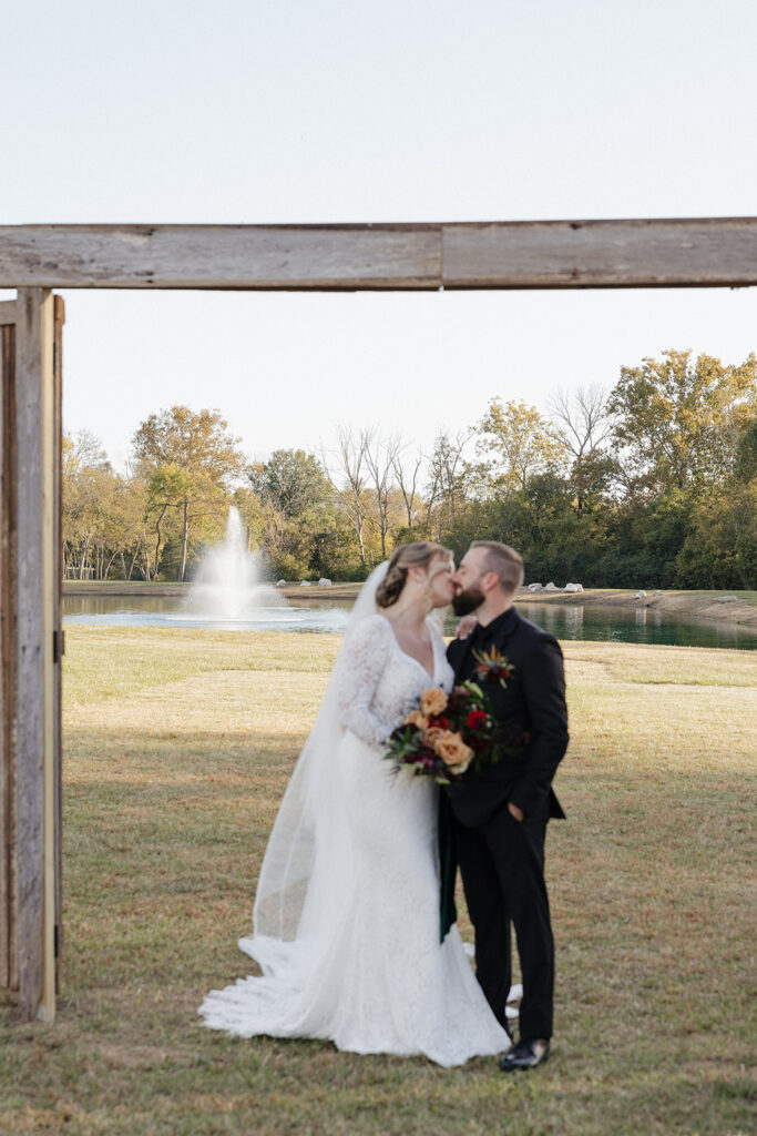 picture of the bride and groom kissing