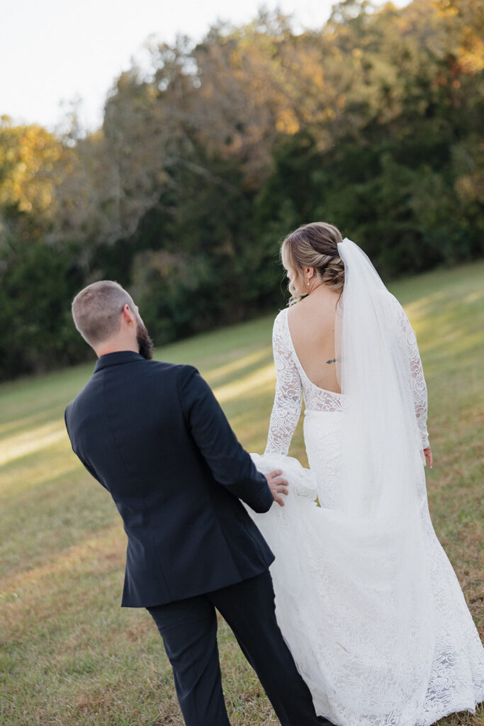 bride and groom walking around their wedding venue