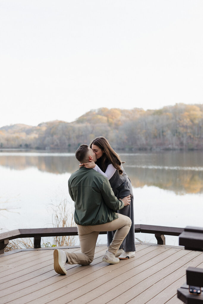 couple kissing during their proposal photoshoot