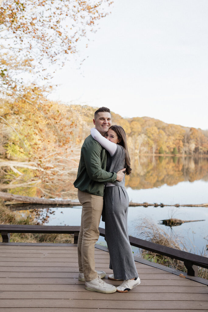 cute picture of the newly engaged couple hugging