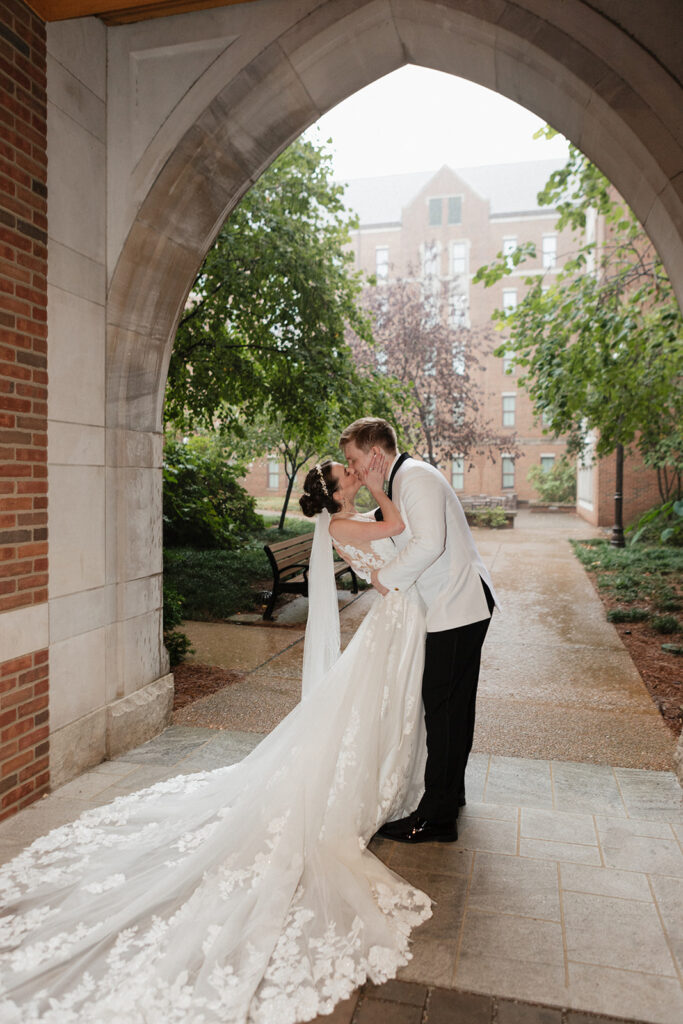 cute couple kissing during their bridal portraits
