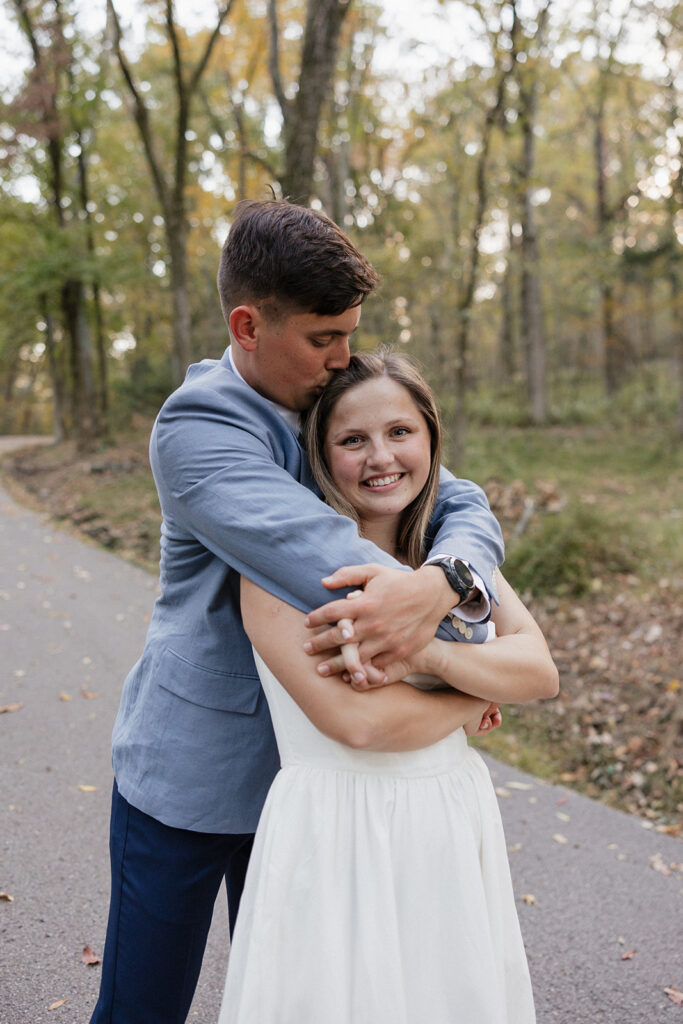 cute picture of the newly engaged couple hugging