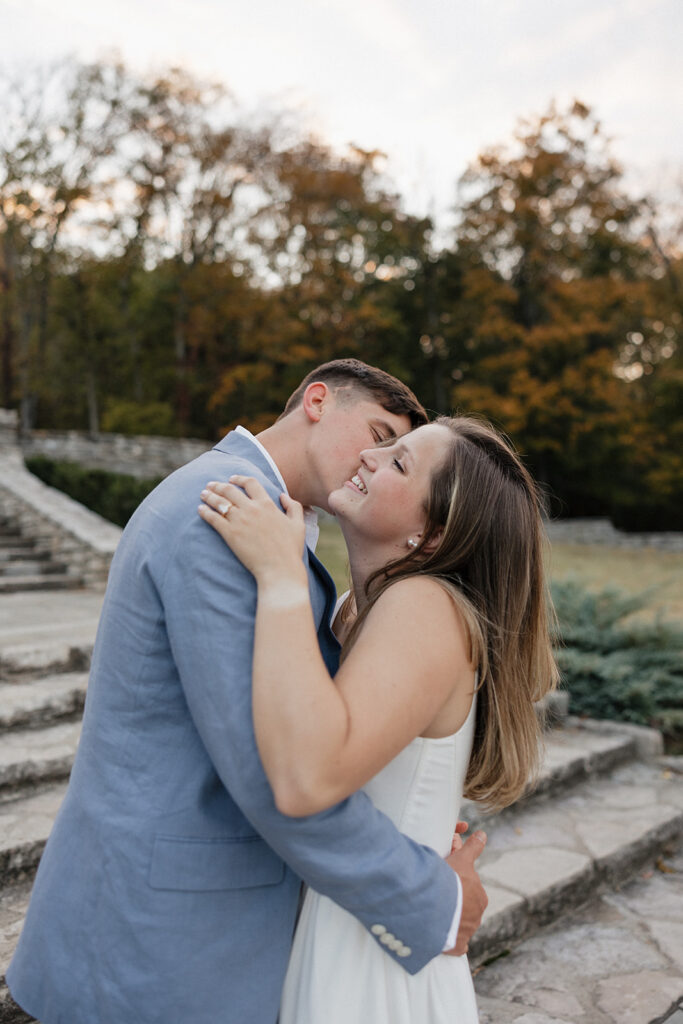 happy couple at their playful engagement photoshoot