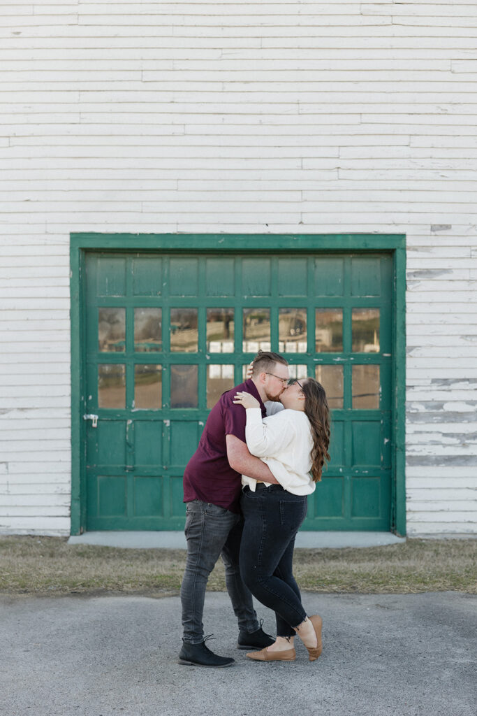 cute couple kissing during their photoshoot