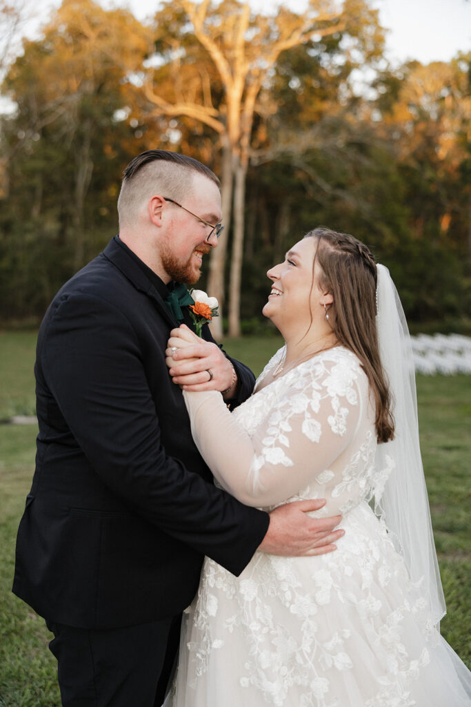 gorgeous picture of the bride and groom looking and smiling at each other