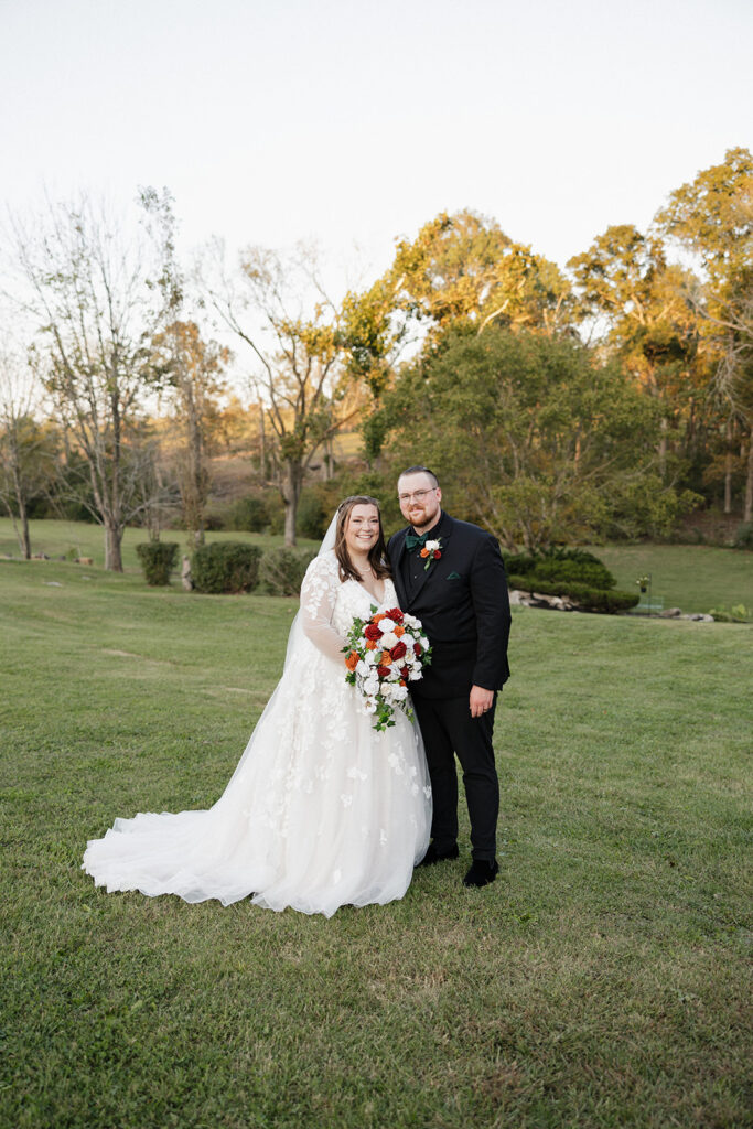 picture of the bride and groom posing for the camera during their bridal portraits