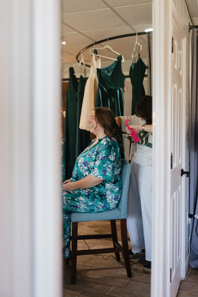 bride getting her makeup done for her dream ceremony